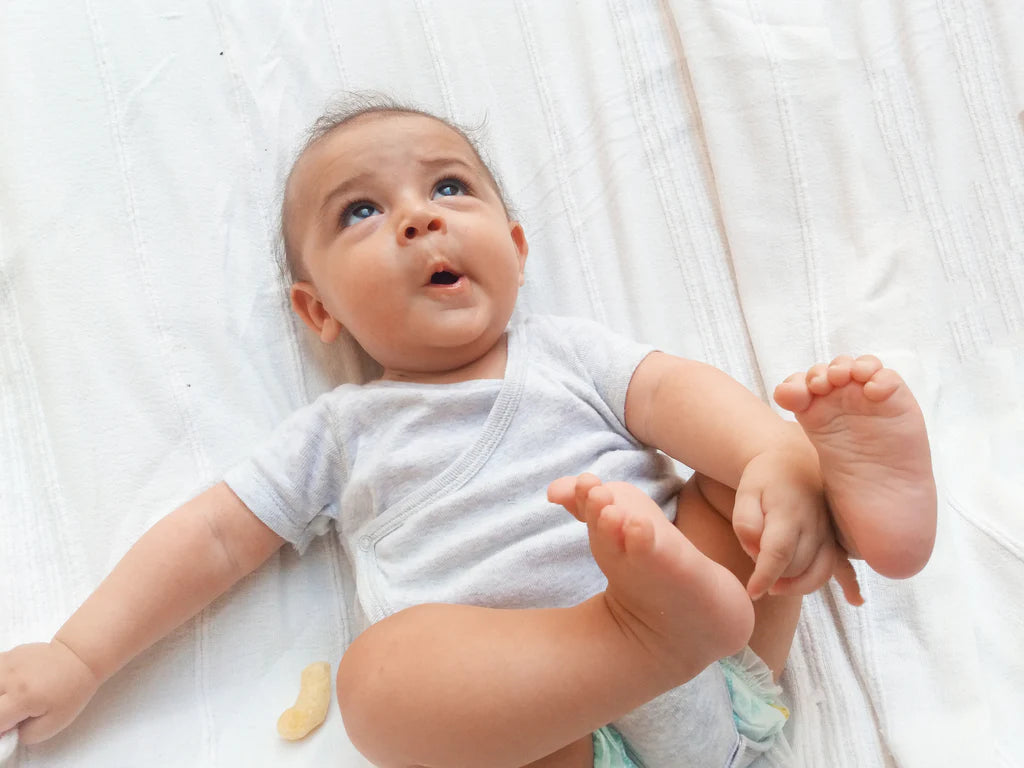 Swaddle Transition Trouble? Top 10 FAQs for Stress-Free Baby Sleep